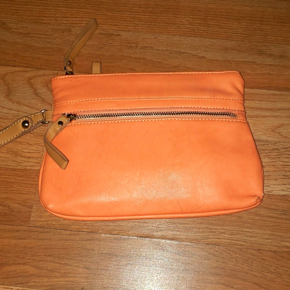 EUC SHIRLEAH wristlet tangerine color
